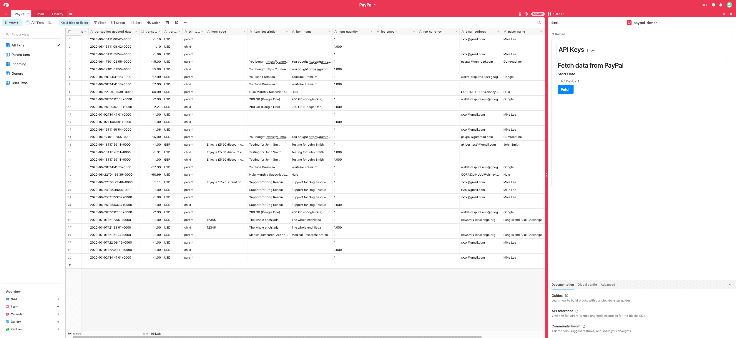 The PayPal Donor Management custom block's UI inside Airtable, showing API key fields and a fetched transaction table
